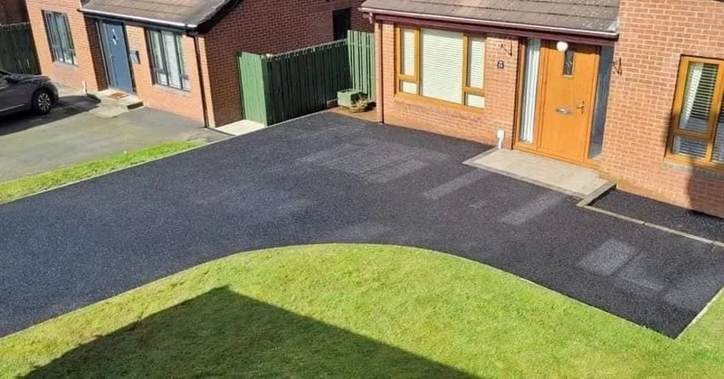 Curved driveway with lawn edging